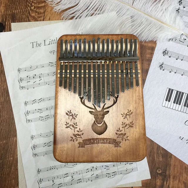 17-keys-thumb-piano-hand-playing-kalimba.jpg