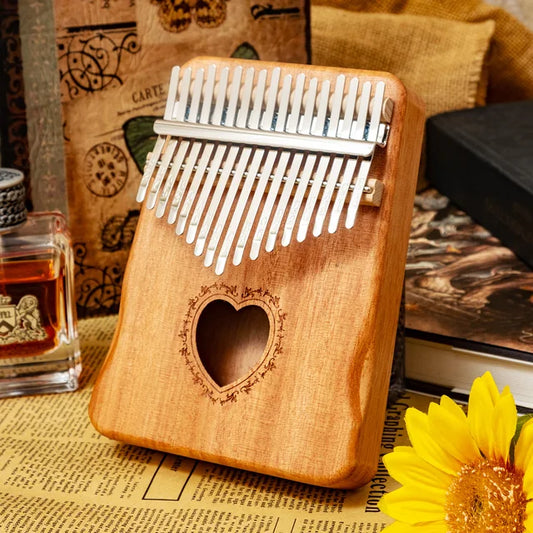 17-keys-thumb-piano-hand-playing-kalimba.jpg