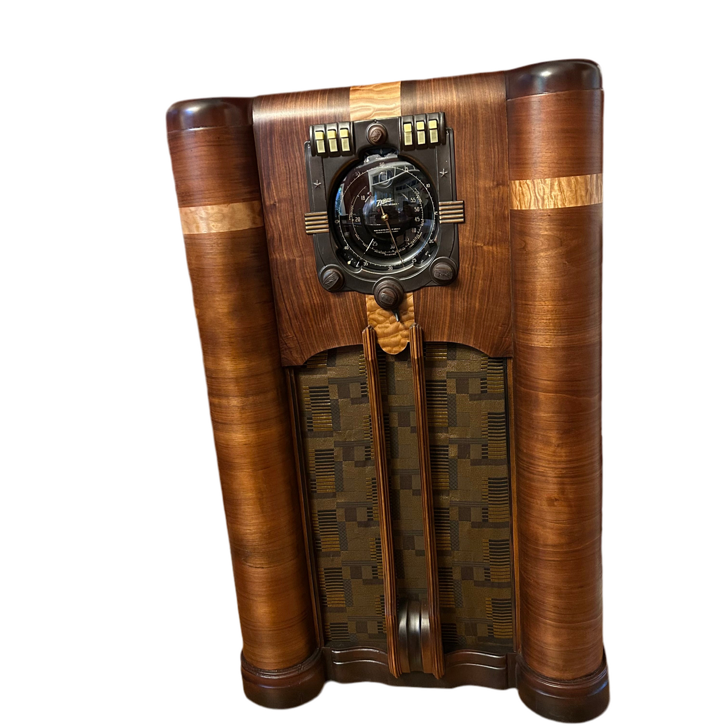 Vintage wooden radio with decorative design on a white background