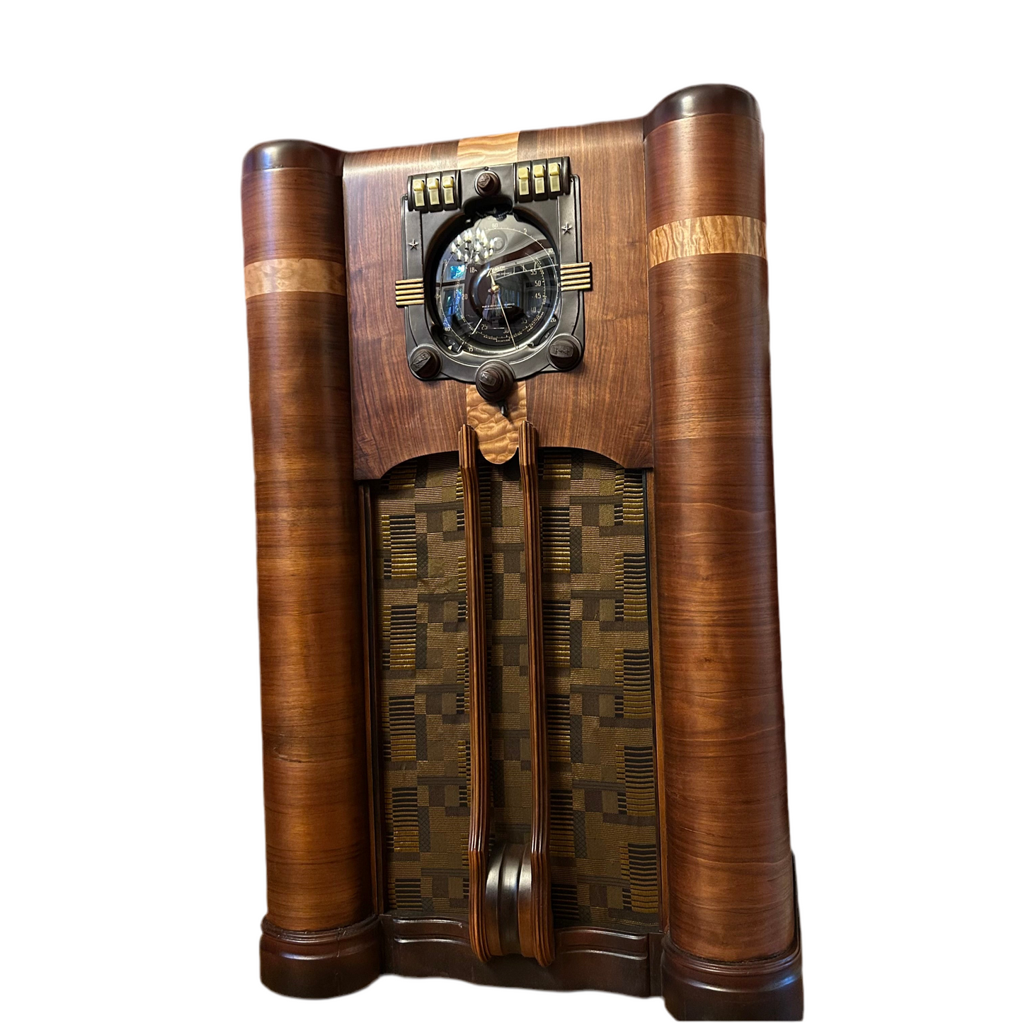 Vintage wooden radio with decorative elements on a white background