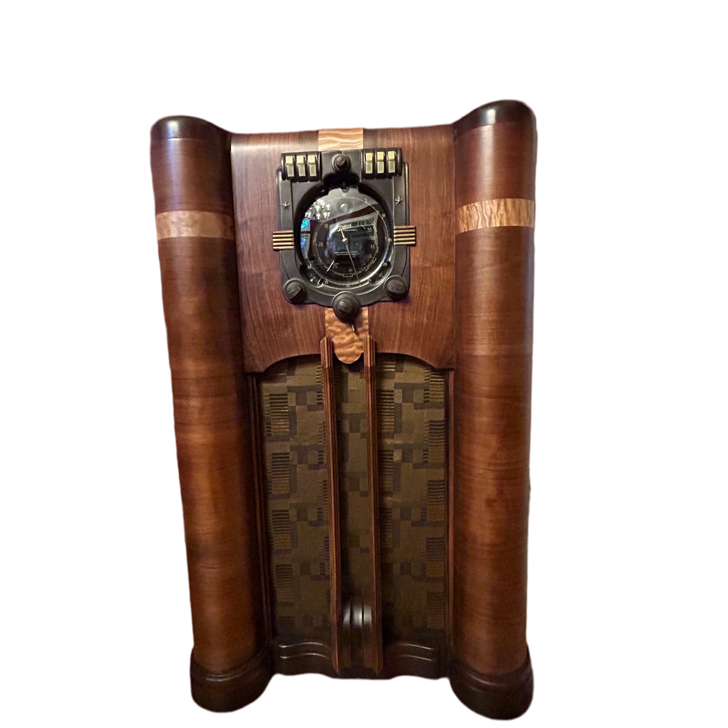 Vintage wooden radio with decorative elements on a white background