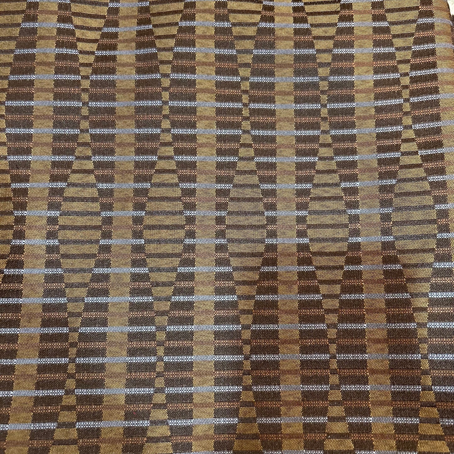 Bronze American-milled vintage-style speaker grill cloth, 100% recycled polyester, 54 inches wide, durable and sustainable with a classic visual repeat pattern