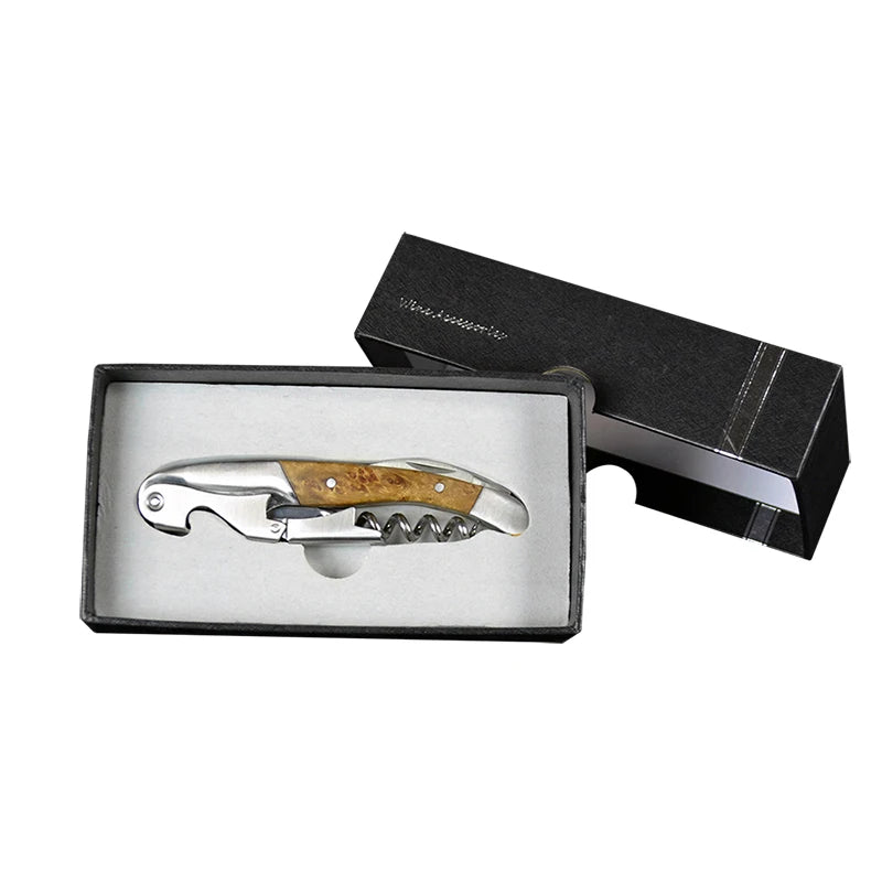 Corkscrew with wooden handle in a black box on a white background