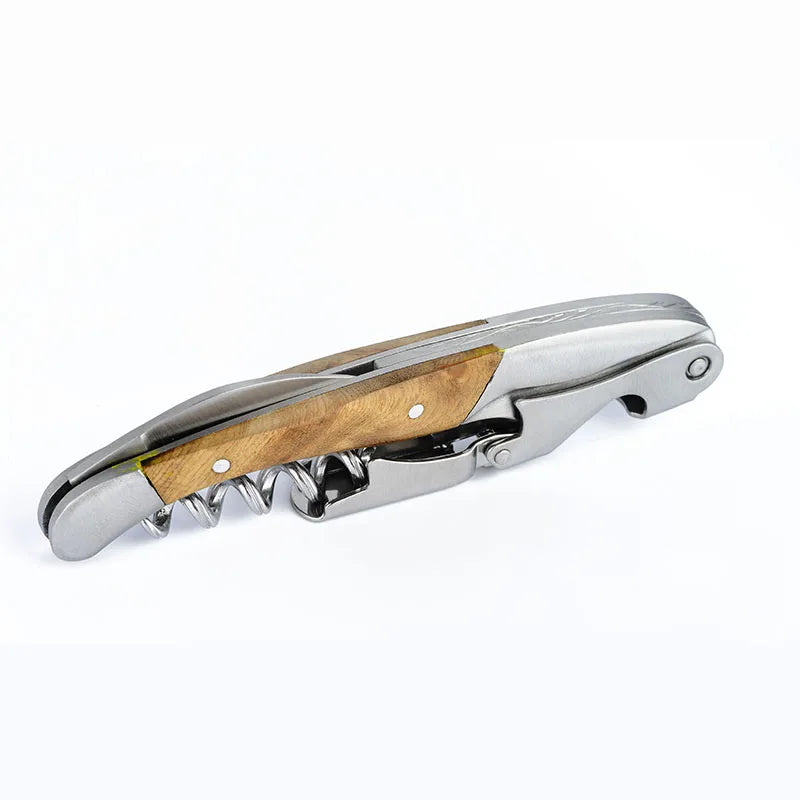Corkscrew with wooden handle on a white background