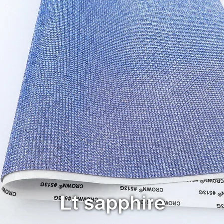 Vibrant adhesive speaker wrap with a sleek design, featuring a decorative glass rhinestone trim for a stylish and elegant touch.