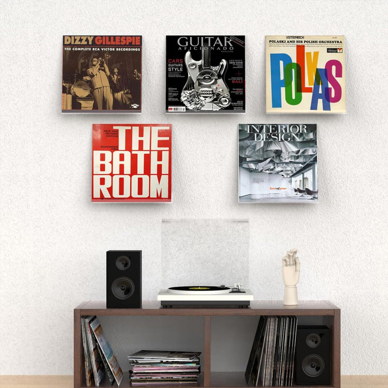 Clear plastic vinyl record display shelf, designed for wall-mounted storage and showcasing LPs, 12-inch, and 7-inch records in a sleek, modern style.