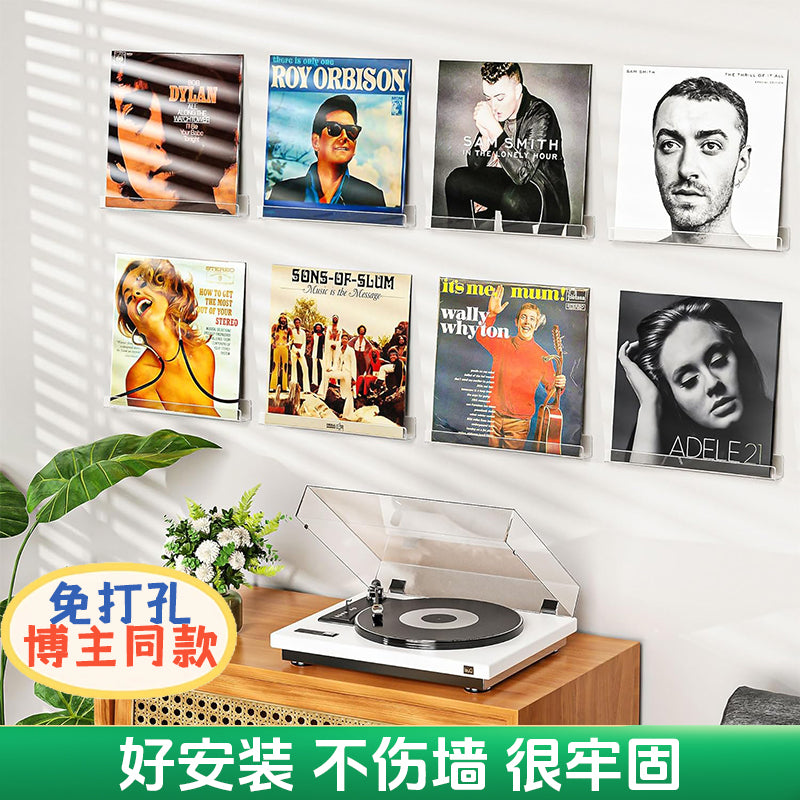 Clear plastic vinyl record display shelf, designed for wall-mounted storage and showcasing LPs, 12-inch, and 7-inch records in a sleek, modern style.