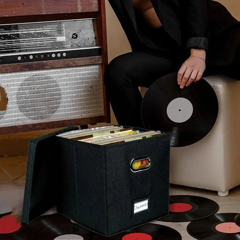 Black vinyl record storage box made of durable cotton linen, designed to hold LPs, 12-inch, and 7-inch records in a sleek and stylish design.