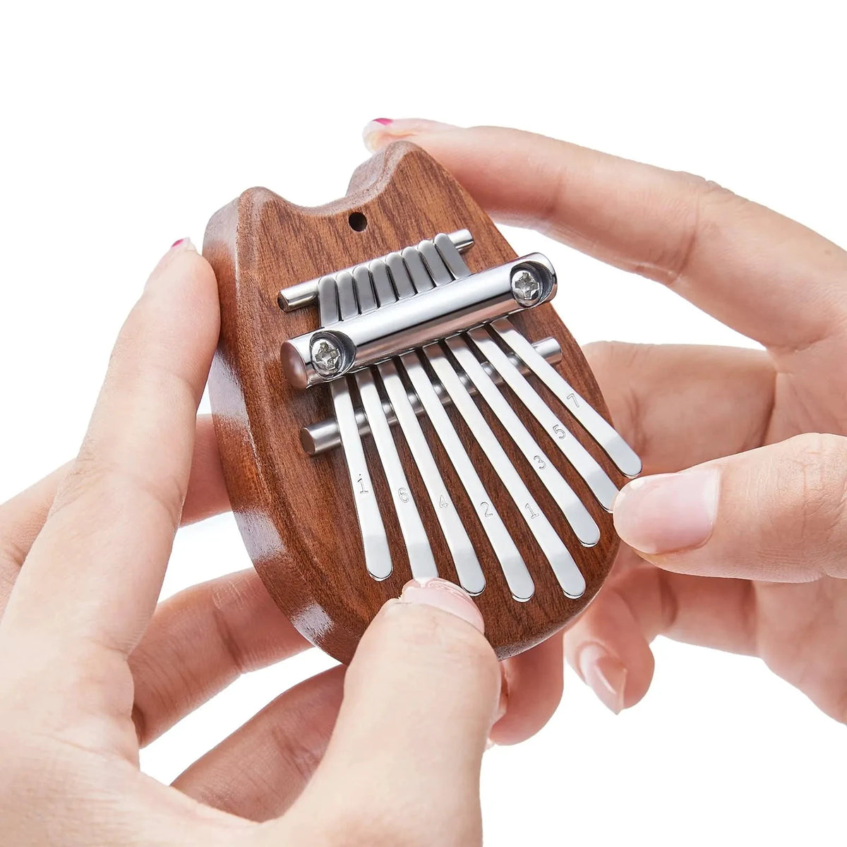 wooden-finger-musical-mini-kalimba-thumb-piano.jpg