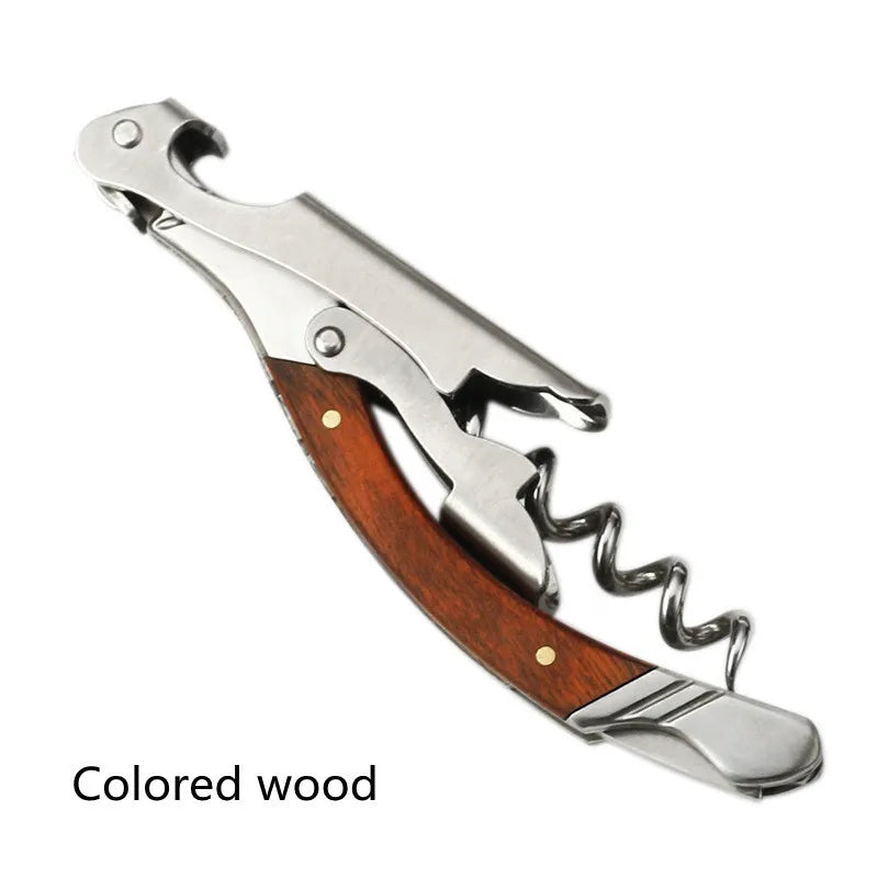 Corkscrew with wooden handle and metal parts on a white background