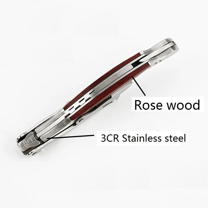 Tie clip with rose wood and 3CR stainless steel components on a white background