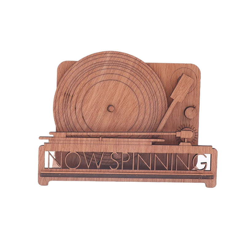 Wooden now spinning record stand with a laser-cut turntable design, available in multiple wood finishes, perfect for displaying vinyl album covers in style.