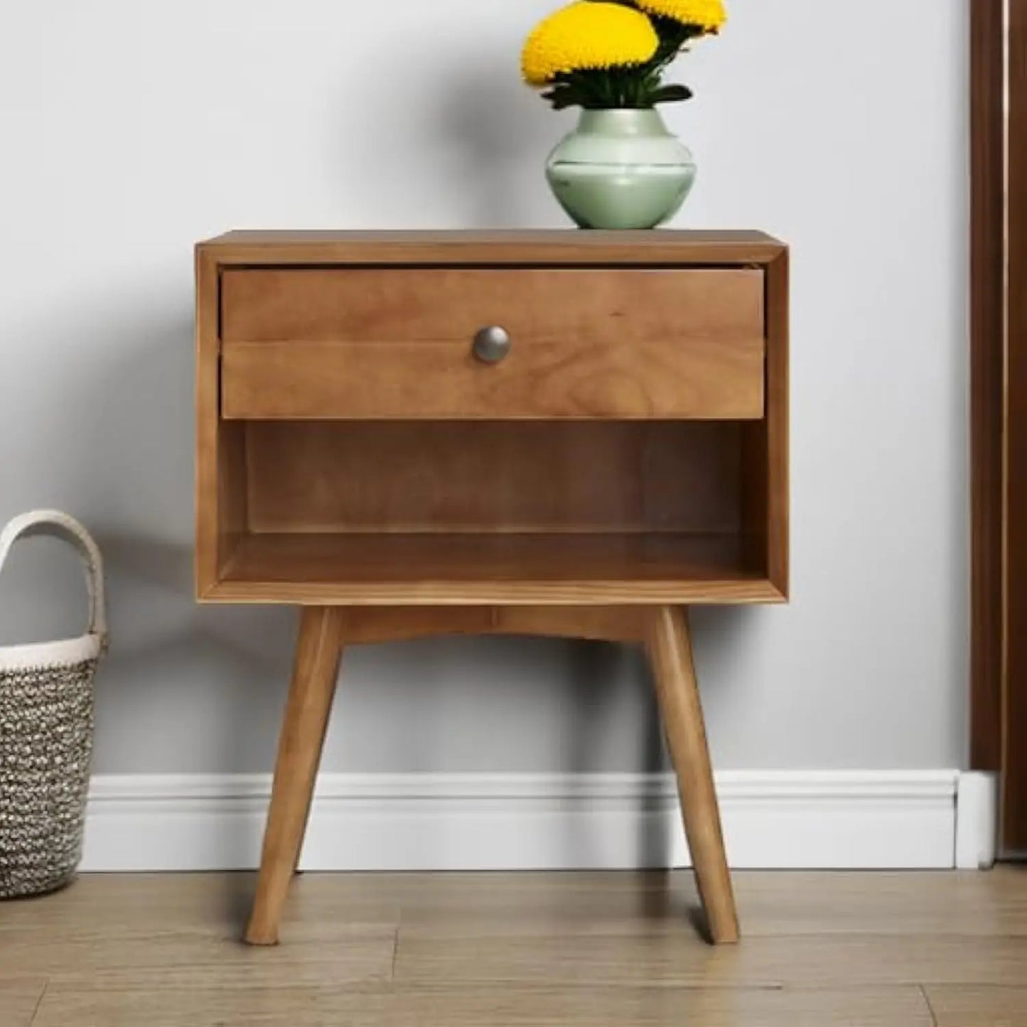 Mid-century turntable stand with vinyl record storage, wooden record player cabinet featuring tapered legs, open shelves, and retro design