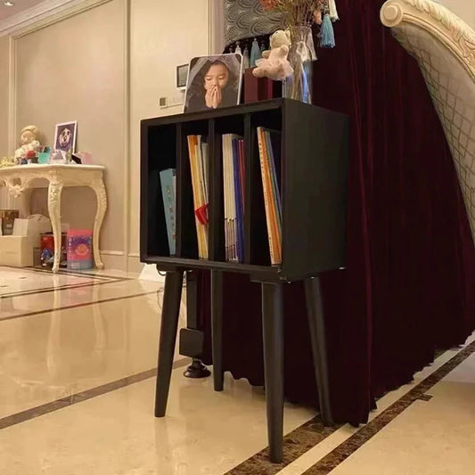 Record storage cabinet with vertical LP compartments, available in white, black, or walnut finish, mid-century modern vinyl organizer with tapered legs