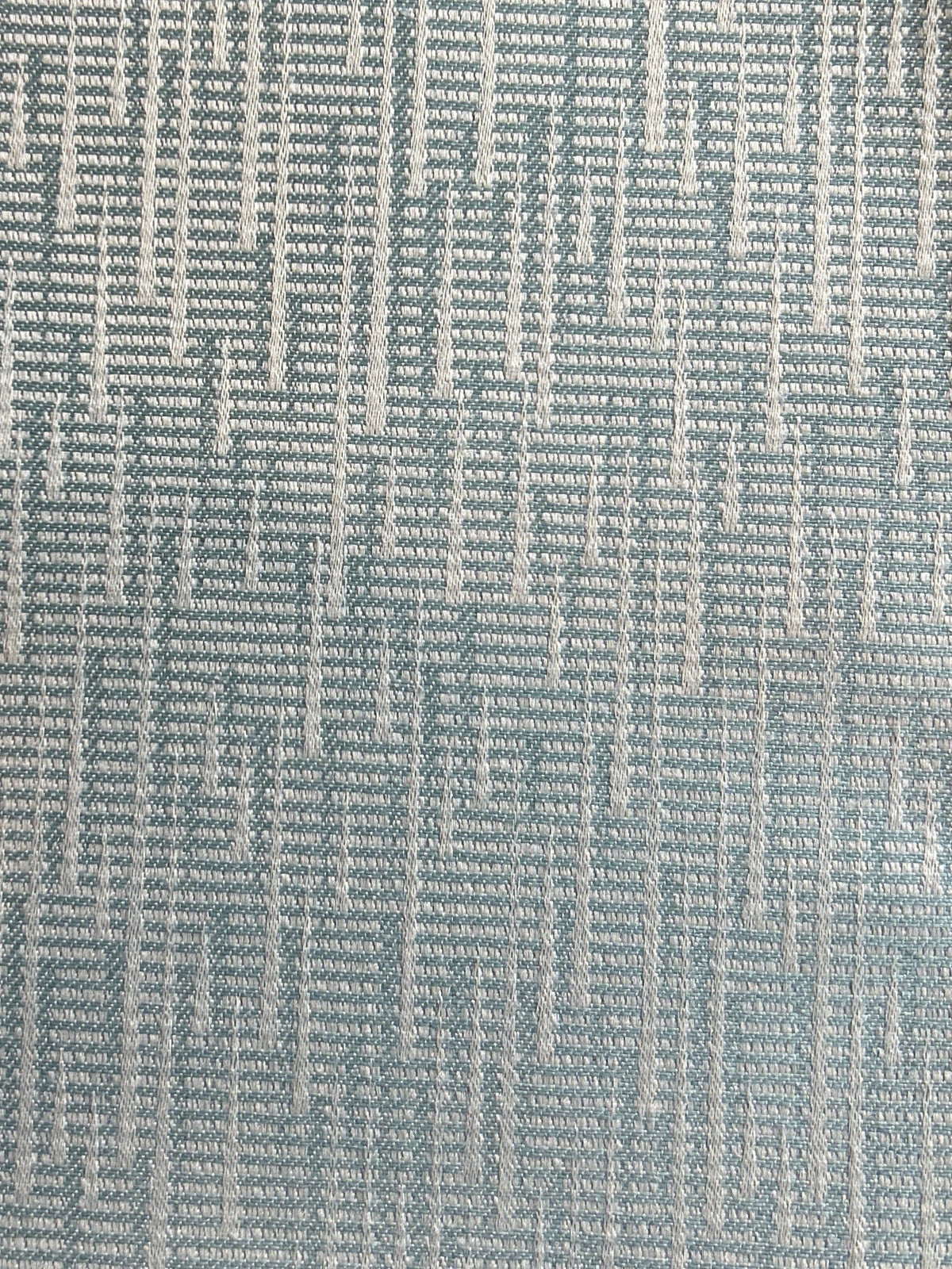 Blue "Sound Burst’ speaker grill cloth with bold wave-like patterns, ideal for vintage speakers and acoustic panels, enhancing style and audio clarity.