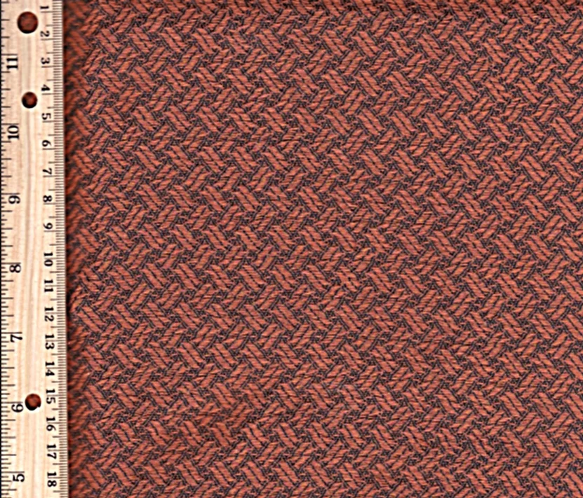 Red vintage speaker grill cloth with a coppery diagonal herringbone pattern, ideal for restoring Crosley and Stromberg Carlson antique radios.