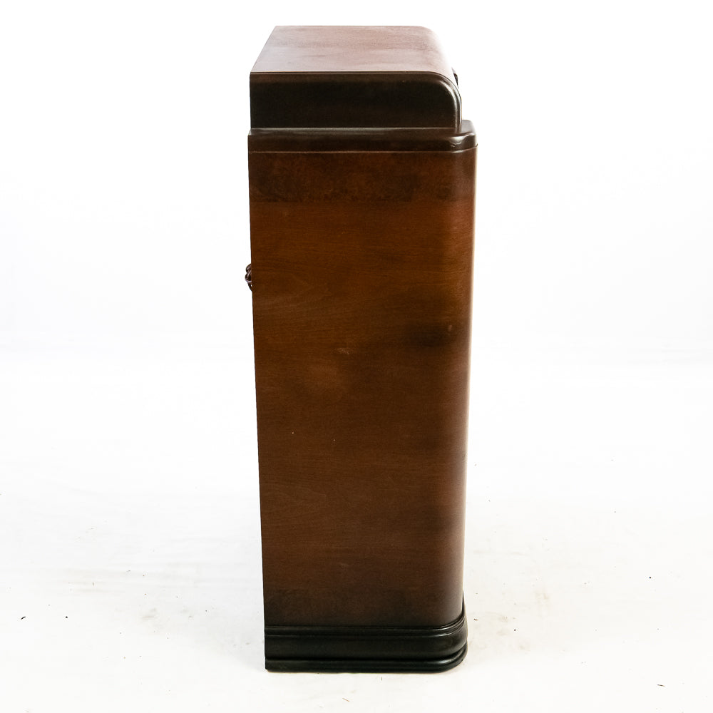 Brown leather-bound book on a white background