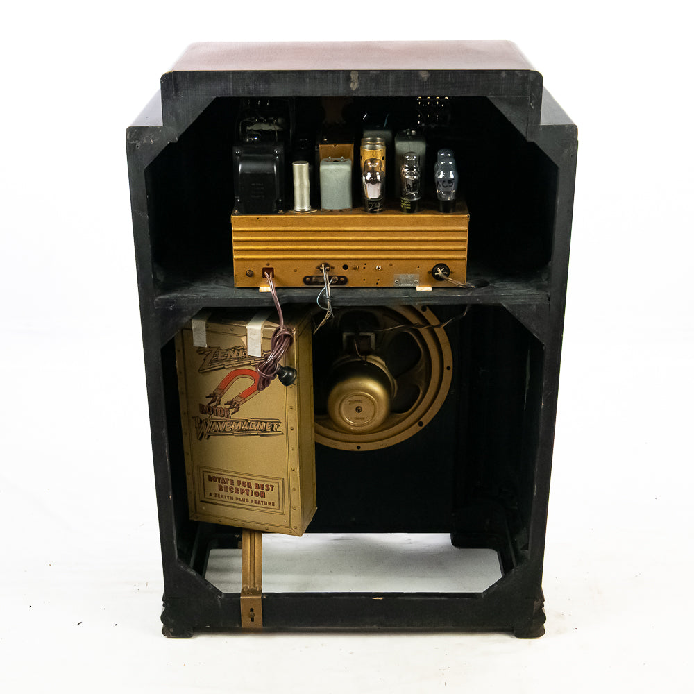 Vintage audio equipment with visible components on a white background