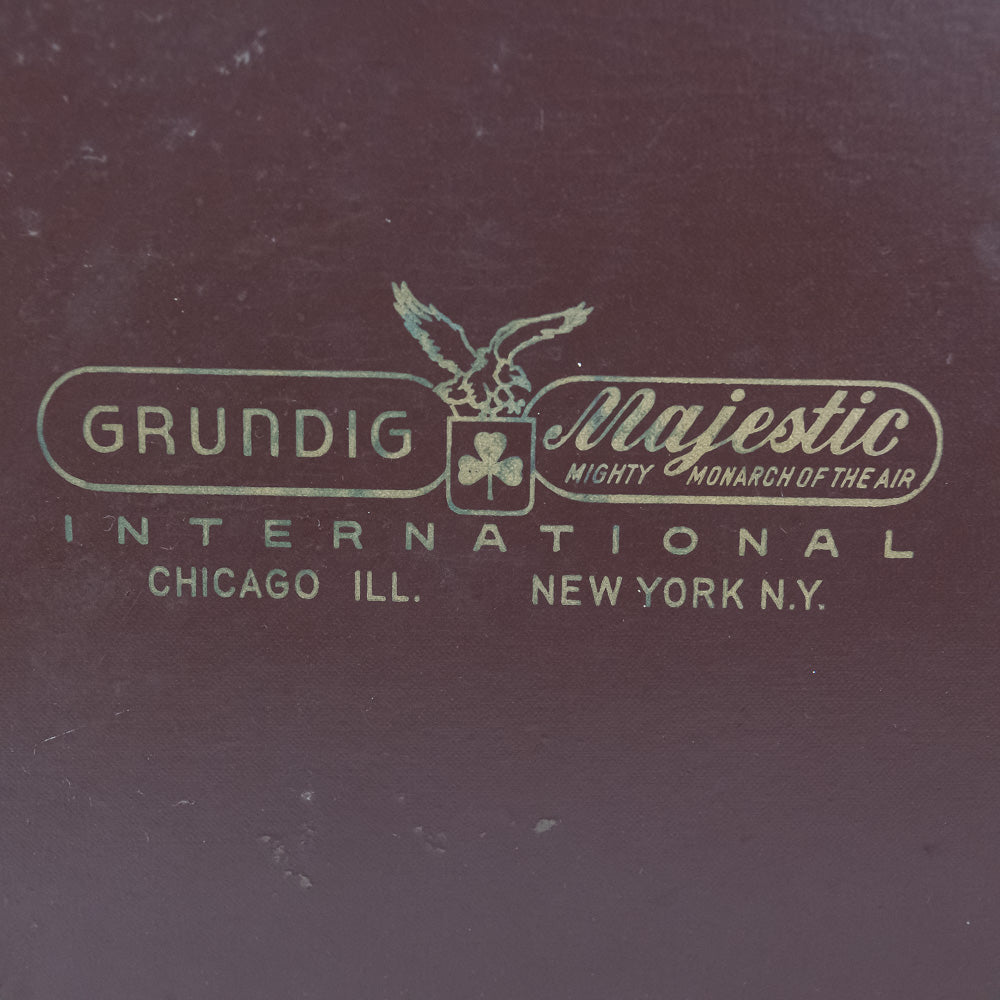 Vintage Grundig Majestic International logo on a dark background