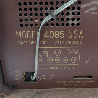 Back panel of an electronic device with model number 4085 USA and technical specifications.