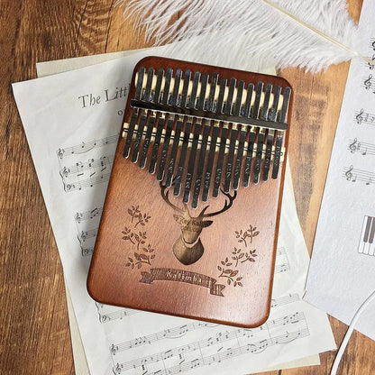 17-keys-thumb-piano-hand-playing-kalimba.jpg