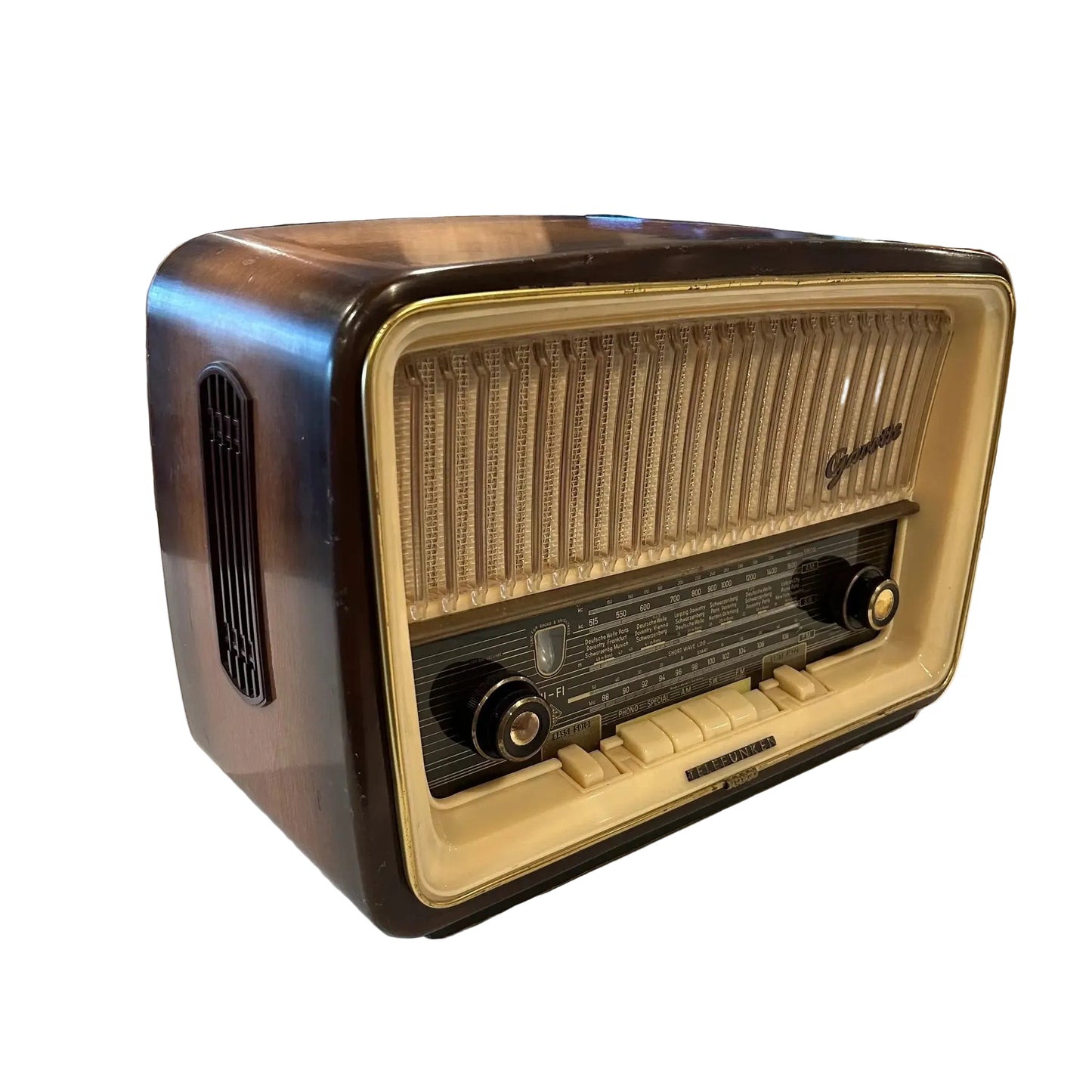 Vintage-style radio on a table with a living room background