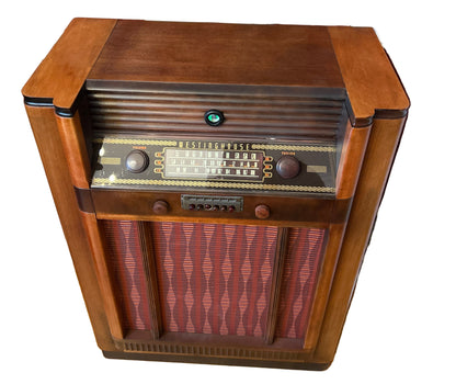 Westinghouse H-113 Mid Century Modern radio console with upgraded Bluetooth and AUX input, featuring a powerful 14-tube amplifier and stunning restored wood finish.