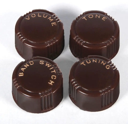 Set of four reproduction radio knobs with inscribed function labels, Grunow and Truetone style