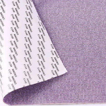 Vibrant adhesive speaker wrap with a sleek design, featuring a decorative glass rhinestone trim for a stylish and elegant touch.
