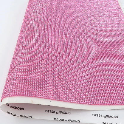Vibrant adhesive speaker wrap with a sleek design, featuring a decorative glass rhinestone trim for a stylish and elegant touch.