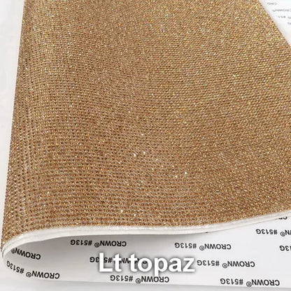 Vibrant adhesive speaker wrap with a sleek design, featuring a decorative glass rhinestone trim for a stylish and elegant touch.