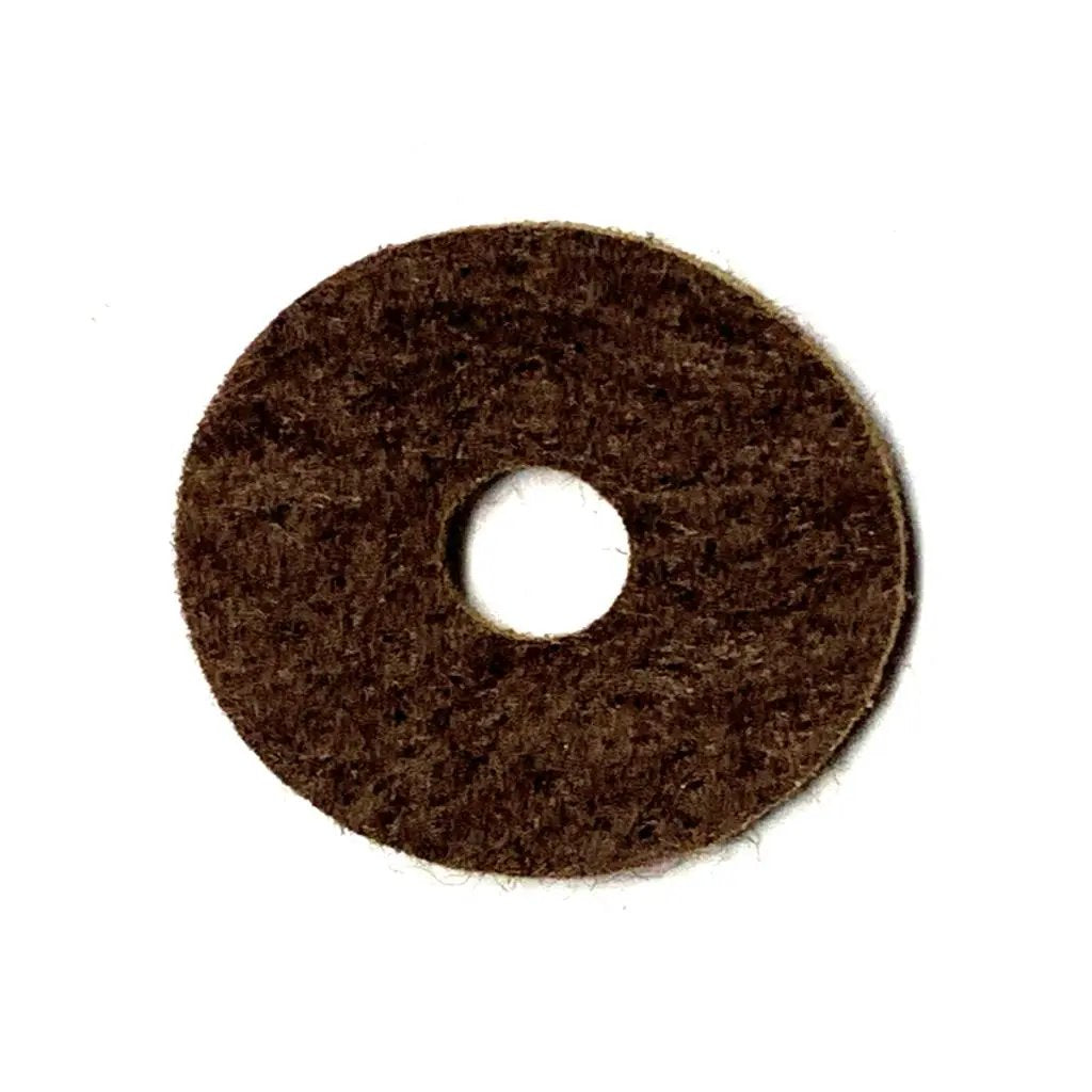 Set of five brown felt washers for antique radio knobs, assorted sizes