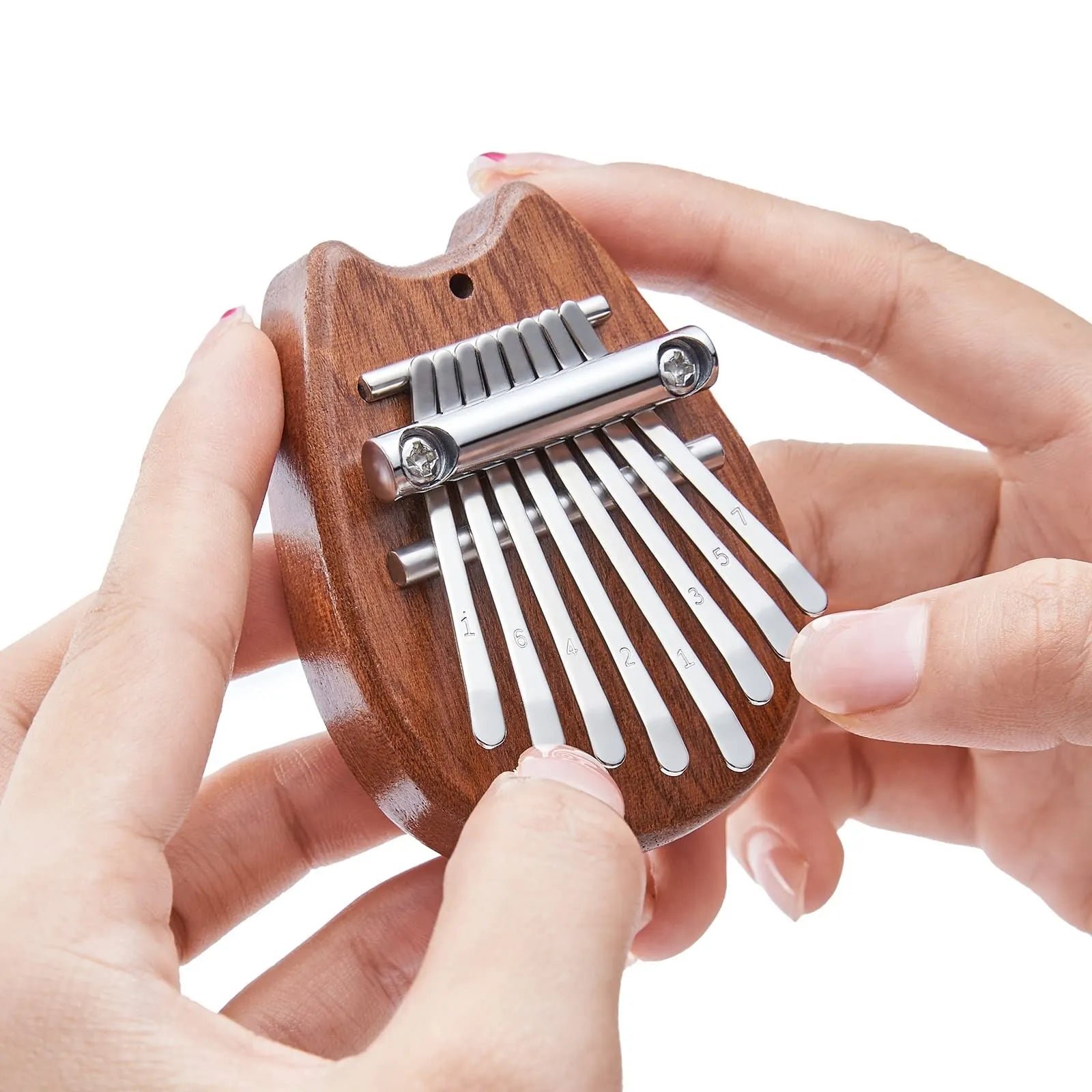 wooden-finger-musical-mini-kalimba-thumb-piano.jpg