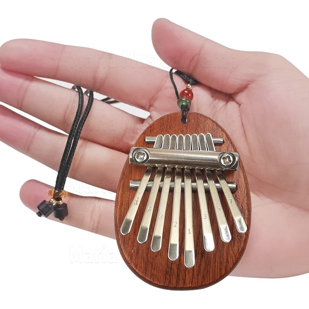 Mini thumb piano