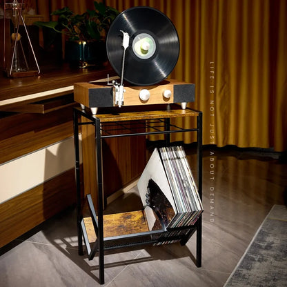 Turntable table with built-in shelves for organized vinyl record storage.