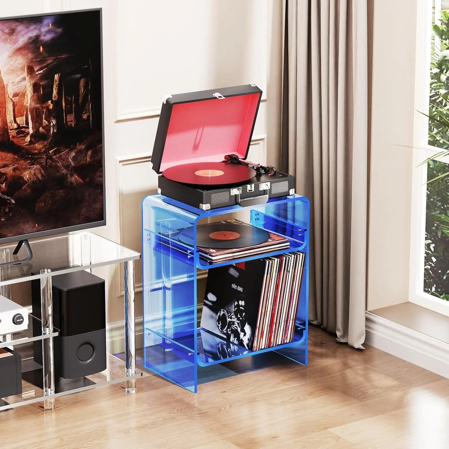 Compact blue record player stand holding LPs and a turntable.